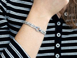 wearing art deco sapphire braclelet with diamonds