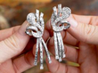 holding night earrings
