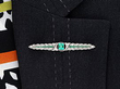1920s Emerald and Diamond Bar Brooch in Platinum wearing