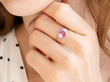 Pink Sapphire Engagement Ring with Baguette Diamonds wearing