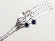 Blue Sapphire and Diamond Drop Earrings in Platinum on a fork