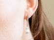 wearing Antique Natural Saltwater Pearl Earring with Diamonds