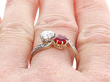 wearing a ruby and diamond bypass ring