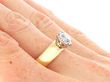 Vintage Unisex Gold Solitaire Engagement Ring on hand