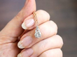 Holding 1.05 Carat Solitaire Pendant