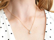 wearing an Antique 1.05 Carat Solitaire Pendant