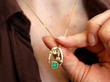 Emerald Pendant Being Worn