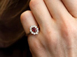 Ruby Cluster Ring Being Worn