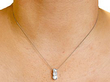 Three Stone Pendant in Platinum on Neck