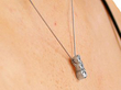 Three Stone Pendant 3/4 view on neck