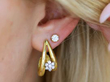 diamond earrings in ear