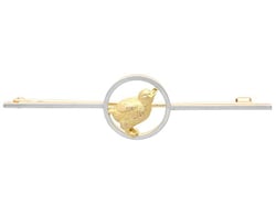 gold chick brooch