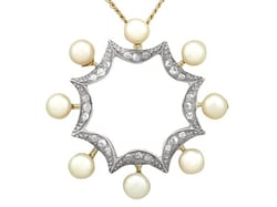 Pearl and diamond pendant yellow gold