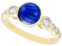 sapphire cabochon ring with diamonds