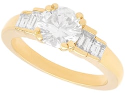 Round and Baguette Diamond Engagement Ring