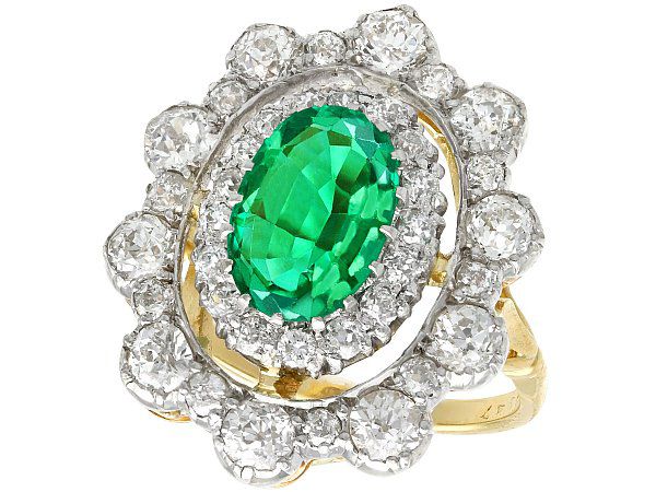 antique emerald and diamond flower ring
