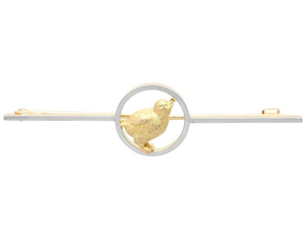 gold chick brooch