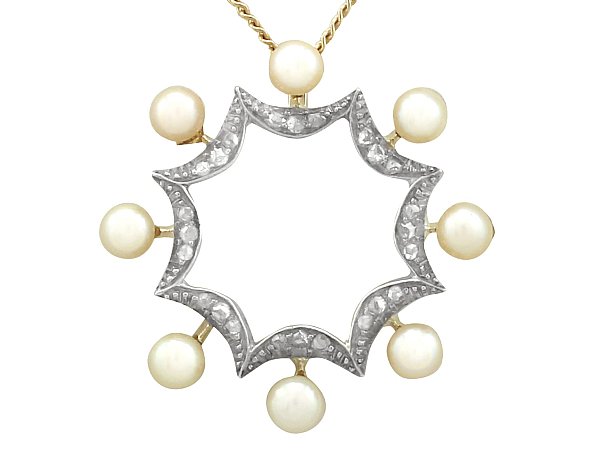 Pearl and diamond pendant yellow gold