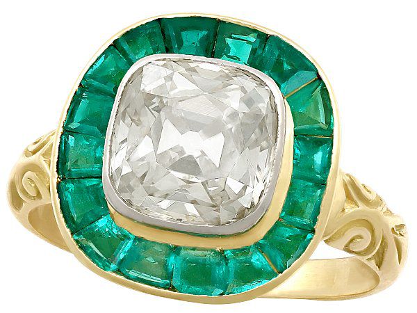 emerald and diamond halo ring