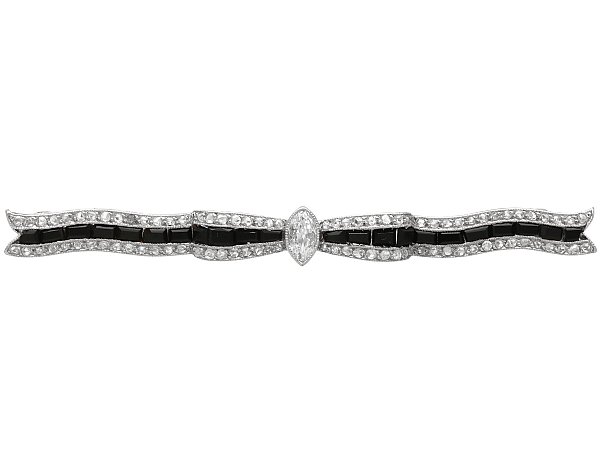 Art Deco Onyx and Diamond Bow Brooch for Sale