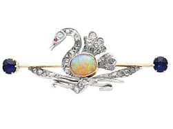 1.50ct Opal, 0.72ct Diamond, 0.90ct Sapphire and Ruby, 9ct Yellow Gold Swan Brooch - Antique Circa 1890
