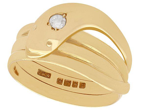 yellow gold and diamond snake dress ring