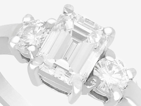 emerald cut trilogy ring