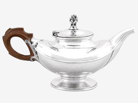 silver teapot and coffee pot