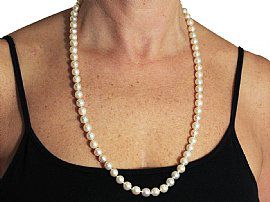 wearing Single Strand Cultured Pearl Necklace