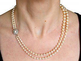 Double strand pearl necklace with clasp
