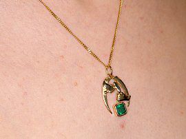 Vintage Emerald Pendant in Gold Wearing Neck