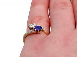 Sapphire Twist Engagement Ring Wearing Finger