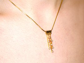 Yellow Gold Diamond Drop Pendant Neck Wearing