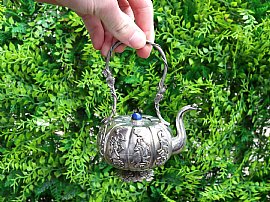 silver teapot outside