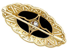 Onyx brooch with diamonds reverse