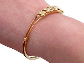 Victorian Gold Bangle with Pearls Wearing Hand