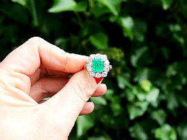 Large Emerald and Diamond Cluster Ring outside 