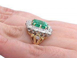 Large Emerald and Diamond Cluster Ring Wearing Hand