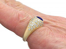 Oval Cut Sapphire and Diamond Ring Wearing Hand