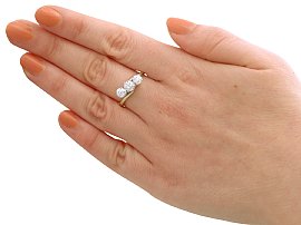 diamond trilogy ring on finger