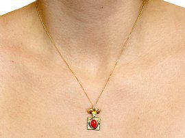 Coral & Gold Pendant Wearing