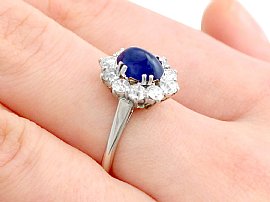wearing a sapphire ring