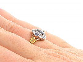 Sapphire and Diamond Cocktail Ring in Yellow Gold Wearing Hand