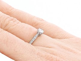 Wearing Diamond and Platinum Solitaire Ring