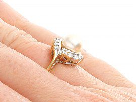 vintage pearl cocktail ring on finger