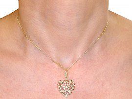 wearing diamond heart pendant