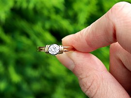 bezel set diamond engagement ring outside