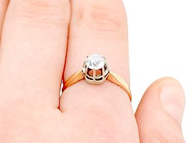14ct gold diamond solitaire ring on finger