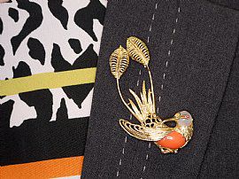 gold bird brooch