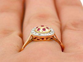 gold ruby ring on finger